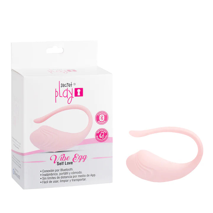 Empaque del Vibe Egg Self-Love de Secret Play junto al dispositivo estimulador rosado.