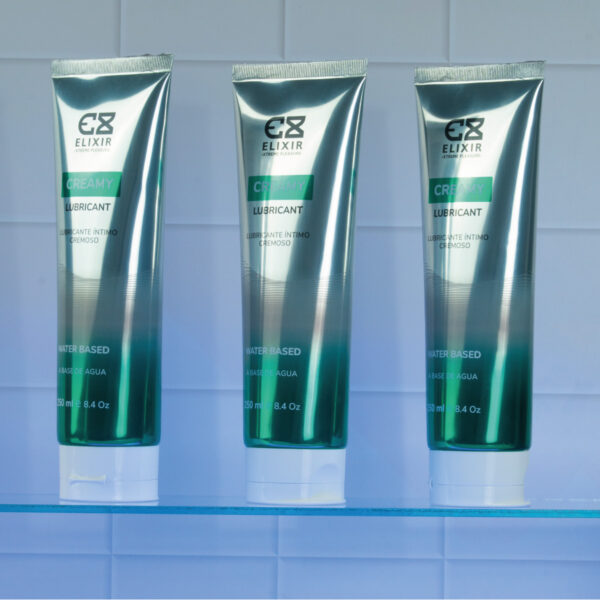 Tres tubos del lubricante blanco cremoso Elixir 250 ml, ideal para uso íntimo realista con base de agua.