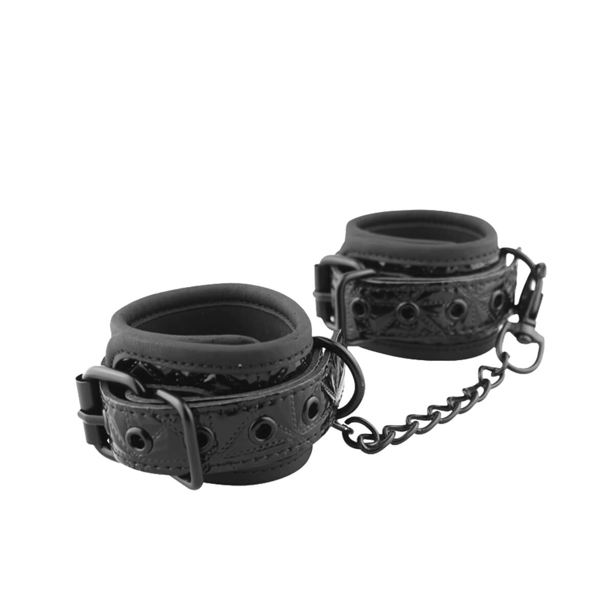 Esposas para muñecas en color negro con acabado brillante, acolchadas y unidas por una resistente cadena metálica.