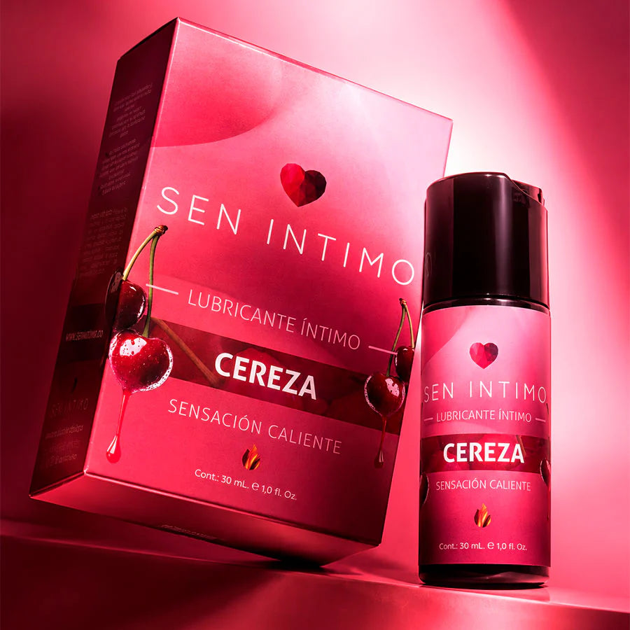 Presentación del lubricante caliente de cereza Sen Íntimo 30 ml con caja y frasco iluminados en tonos rojos.