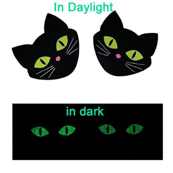 pezoneras de gatito negro que brillan 